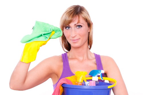 Professional office cleaners working in a Westminster workspace