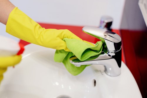 Professional Westminster cleaners finishing a clean and organized space