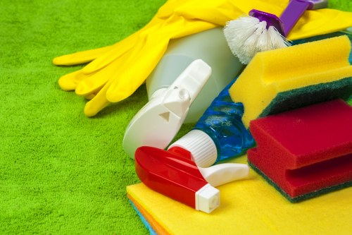 Cleaning staff using protective gloves with approved products