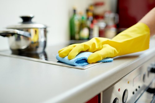 Staff handling waste in line with UK disposal regulations